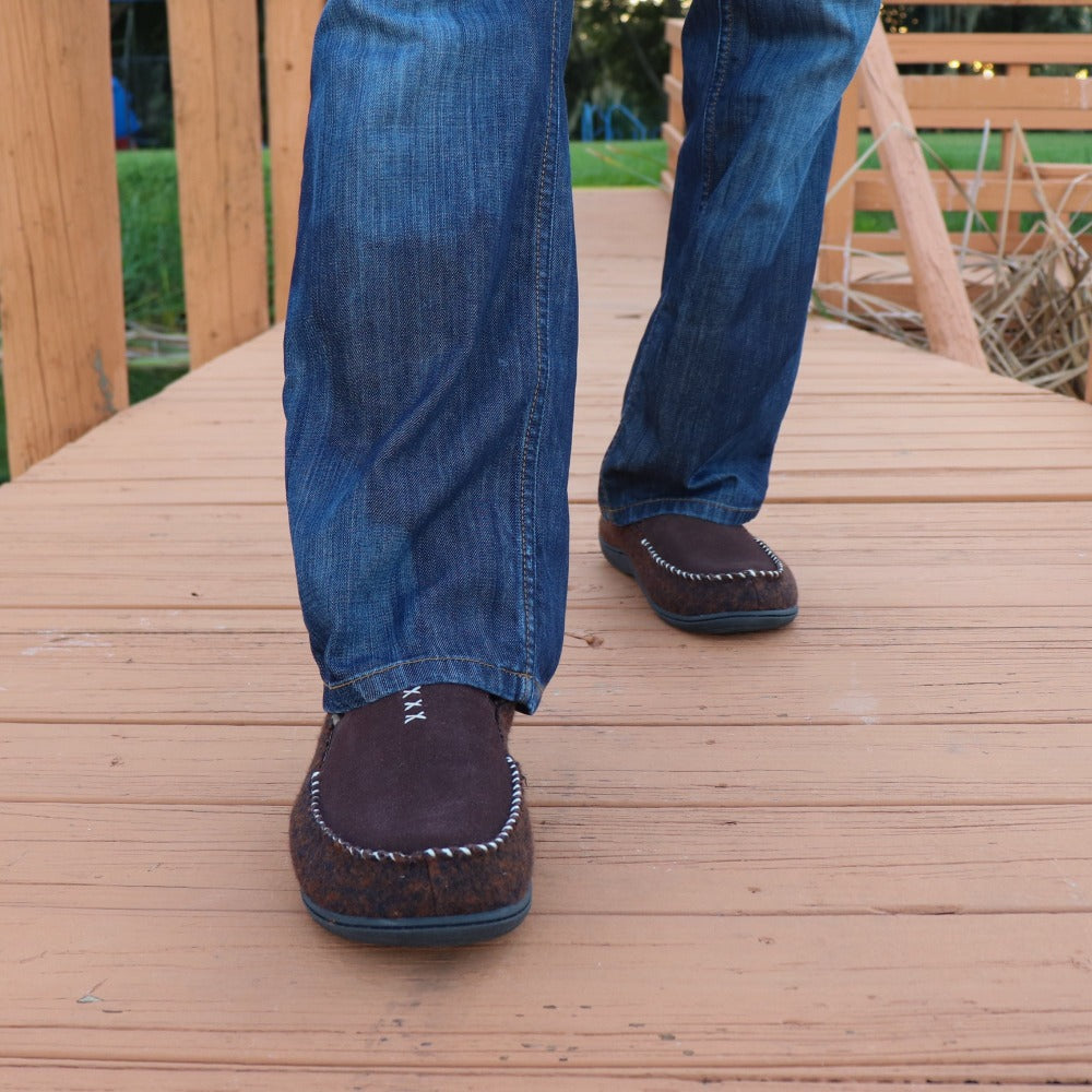 Men's Crafted Moc Slippers on figure walking down a wooden boardwalk#color_walnut