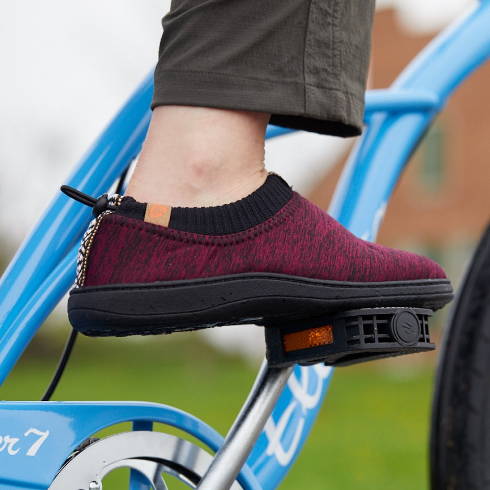 Women's Explorer Adventure Moc on figure riding bike#color_garnet-heather